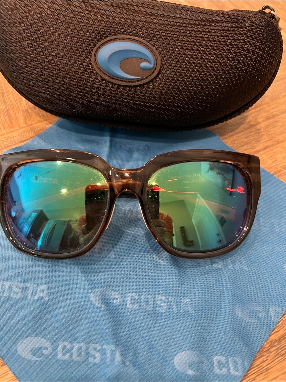 Costa Women’s sunglasses - Brown Translucent Frame with Green-Blue Mirrored Lens